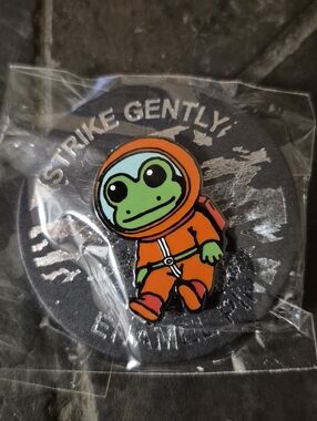 Green Frog Astronaut Enamel Pin - Orange Suit